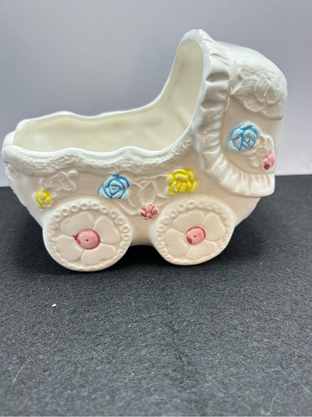 Glossy Ceramic Baby Carriage Planter in White with Pink, Blue & Yellow Accents
